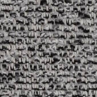 Gray tweed fabric texture with irregular weave, speckled with black flecks, displaying a dense, nubby surface and “costantini pietro” label.